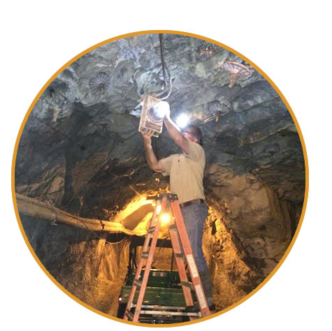 Bullert Team Member Installing Electric in a Mine